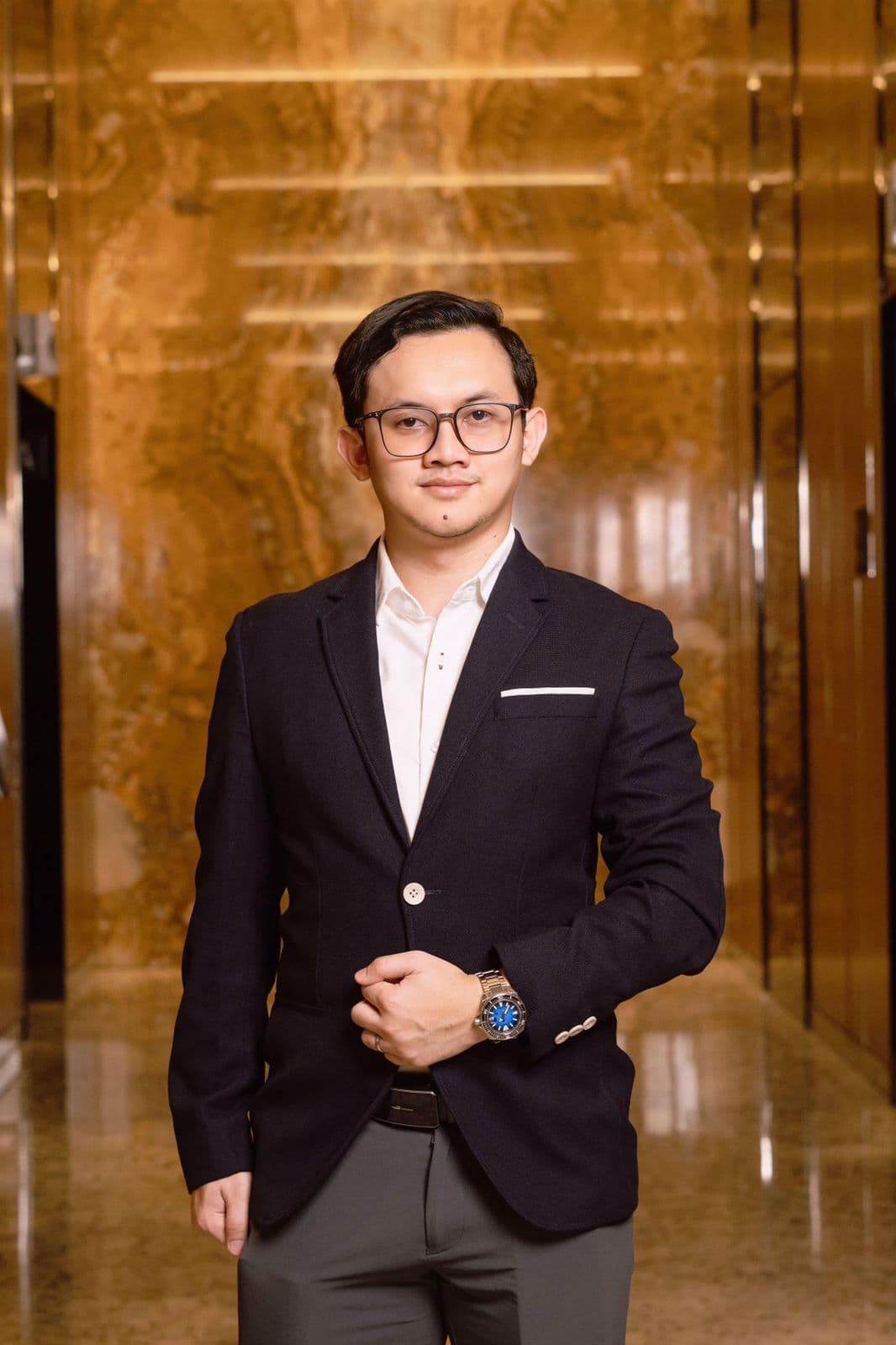 Zakky Ashidiqi, S.I.A., CTA., CFA., CFP., BKP